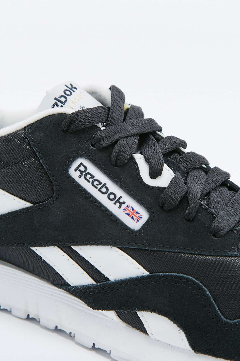 reebok classic black and white trainers